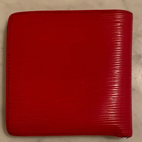 Red leather Louis Vuitton wallet